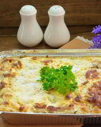 Макароны, фаршированные фаршем и сыром, в духовке