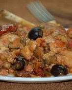 Кролик с маслинами и коньяком