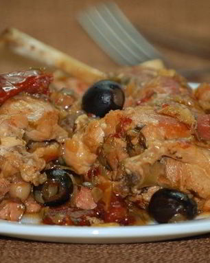 Кролик с маслинами и коньяком