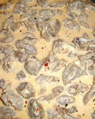 Куриные сердечки, тушенные в сливках