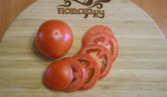 кабачки, жареные с чесноком и помидорами