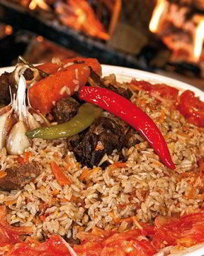 Плов в казане на плите