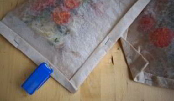 белая рыба в конверте с каперсами