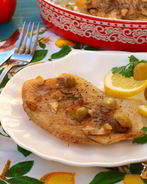 Филе тилапии запеченное с лимоном и оливками