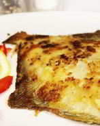 Камбала под соусом