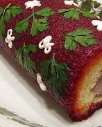 Рулет из филе сельди с овощами